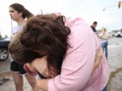 'I love you so much': The tear-jerking moment a mother is reunited with her lost son after the Oklahoma tornado