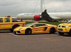If only the queues moved this quickly! Heathrow takes delivery of £260,000 217mph Lamborghini... but refuses to say what it's for
