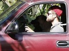 Robert Pattinson moves out of Kristen Stewart's home with truck full of belongings and his dog