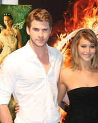 jennifer lawrence & liam hemsworth almost catch fire at cannes